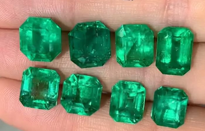 Emeralds on palm